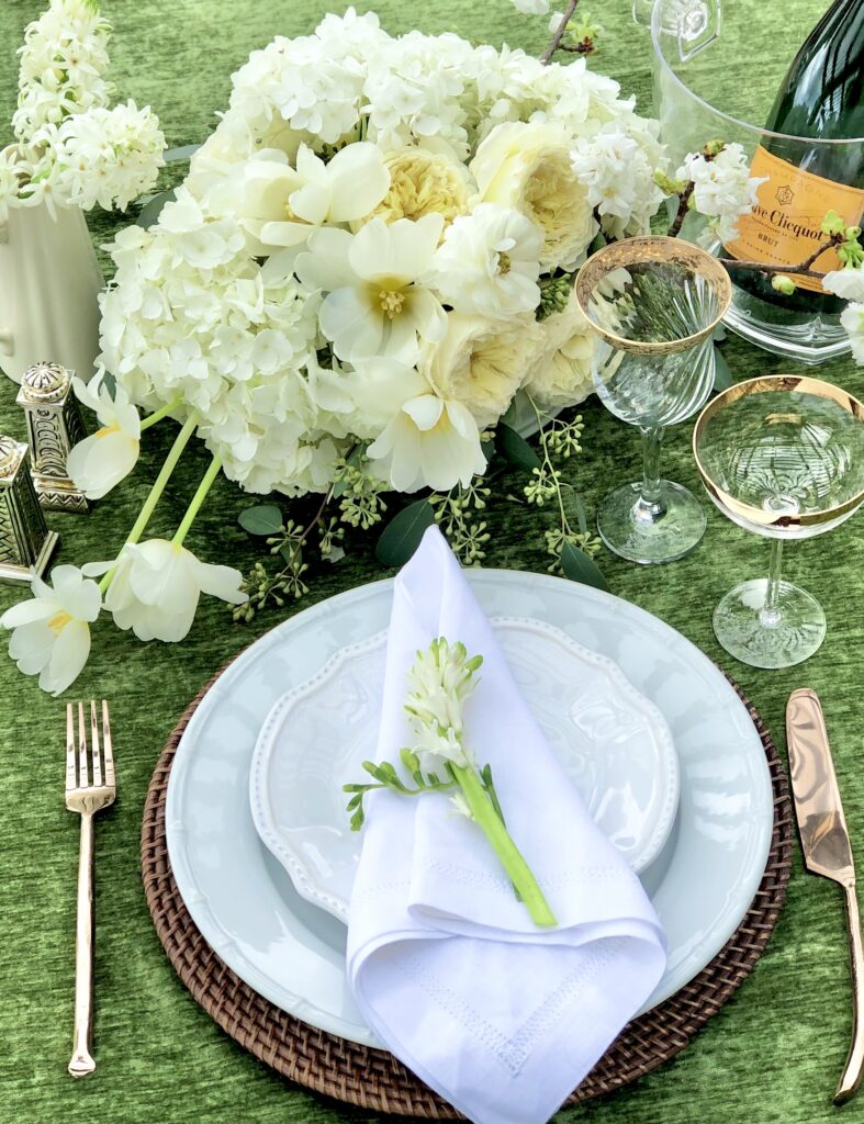 Spring green and white place setting outdoor entertaining
